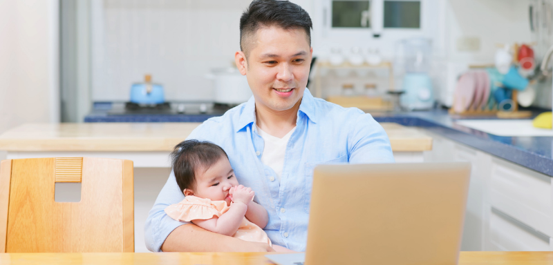 father using computer